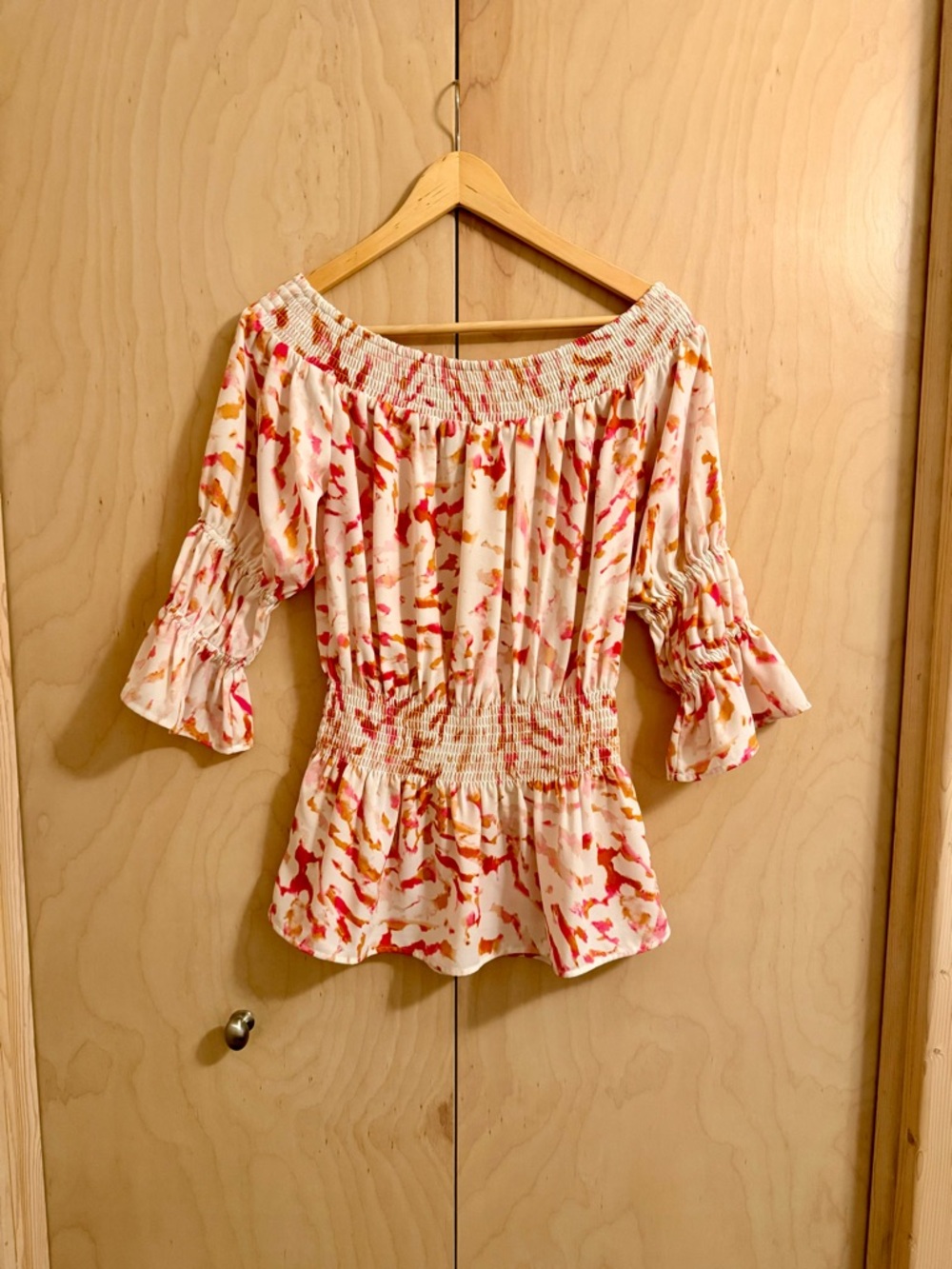 CAbi Off-Shoulder Smocked Peplum Blouse in White with Pink & Orange Print XS